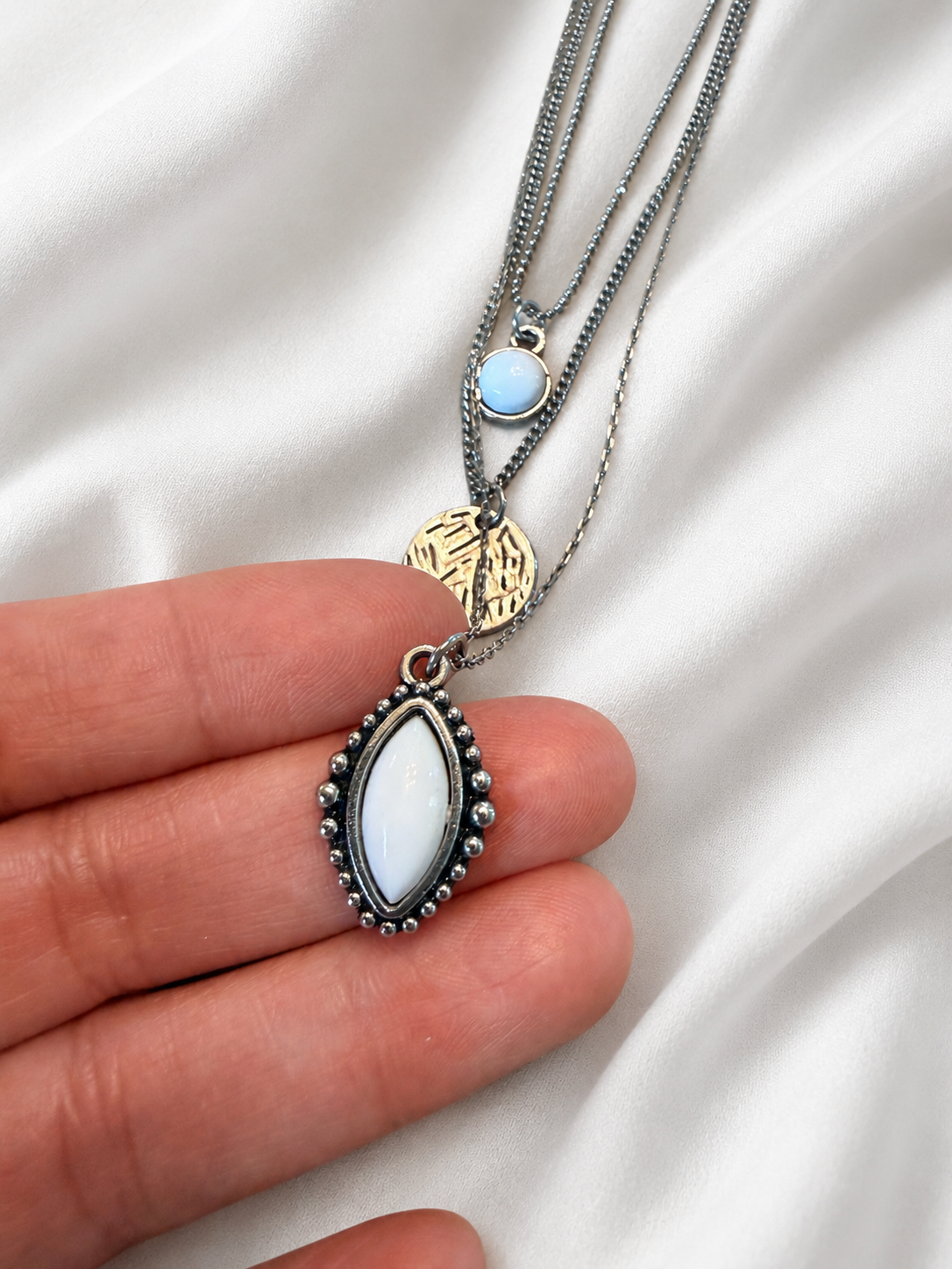 Layered Silver Tone Three-Tier Pendant Necklace with White Stone and Coin Charms
